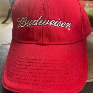 Budweiser red and white ball cap.